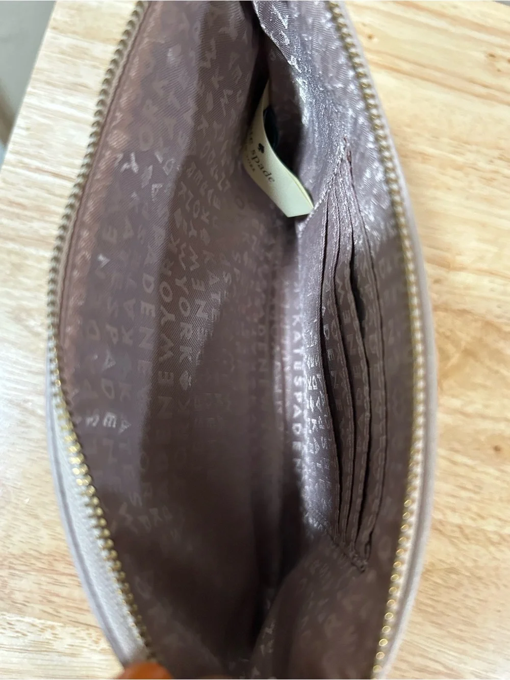 kate spade pebbled leather wristlet in light taupe with beige trim